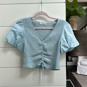 Vestique light blue crop top